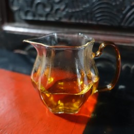 Plum shaped Glass Tea Pitcher with yellow handle