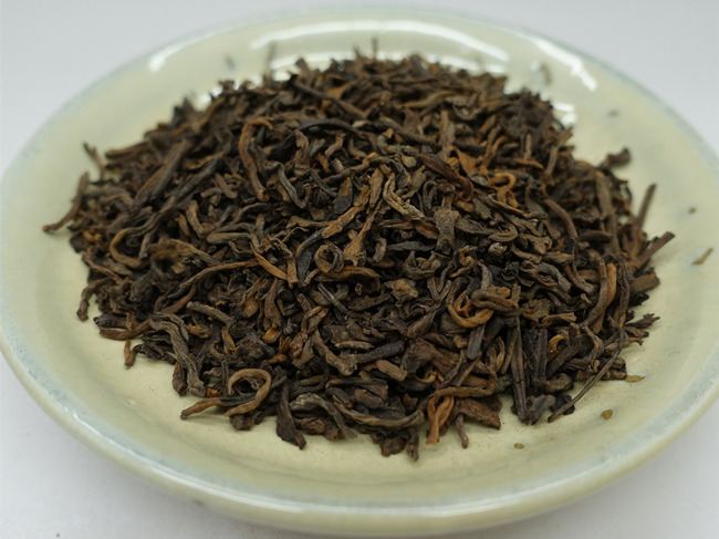 1999 Menghai "Zhang Xiang" 3rd Grade Fermented Puerh Tea 50g 1999 Menghai "Zhang Xiang" 3rd Grade Fermented Puerh Tea 50g